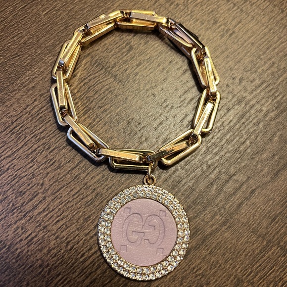 Keep It Gypsy Jewelry - Luxurious Gold Bracelet with Pink Emblem